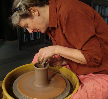 Ceramics class wheel throwing at Community Folk Art Center