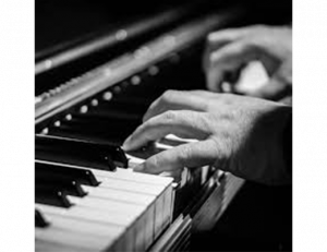 Image of Person playing Piano