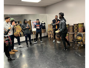 Image of Students Drumming at The Community Folk Art Center.