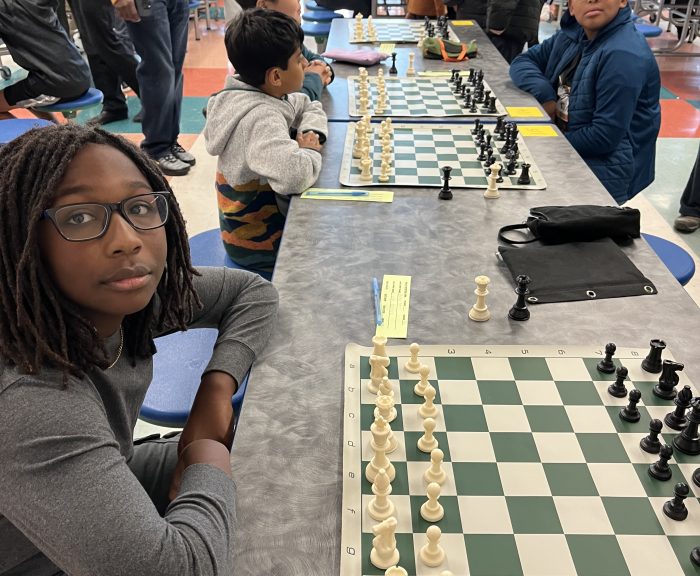 Student Playing Chess